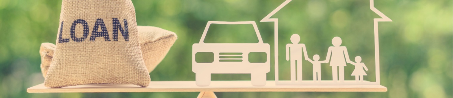 a bag of money on a balance next to a model car and a family of four